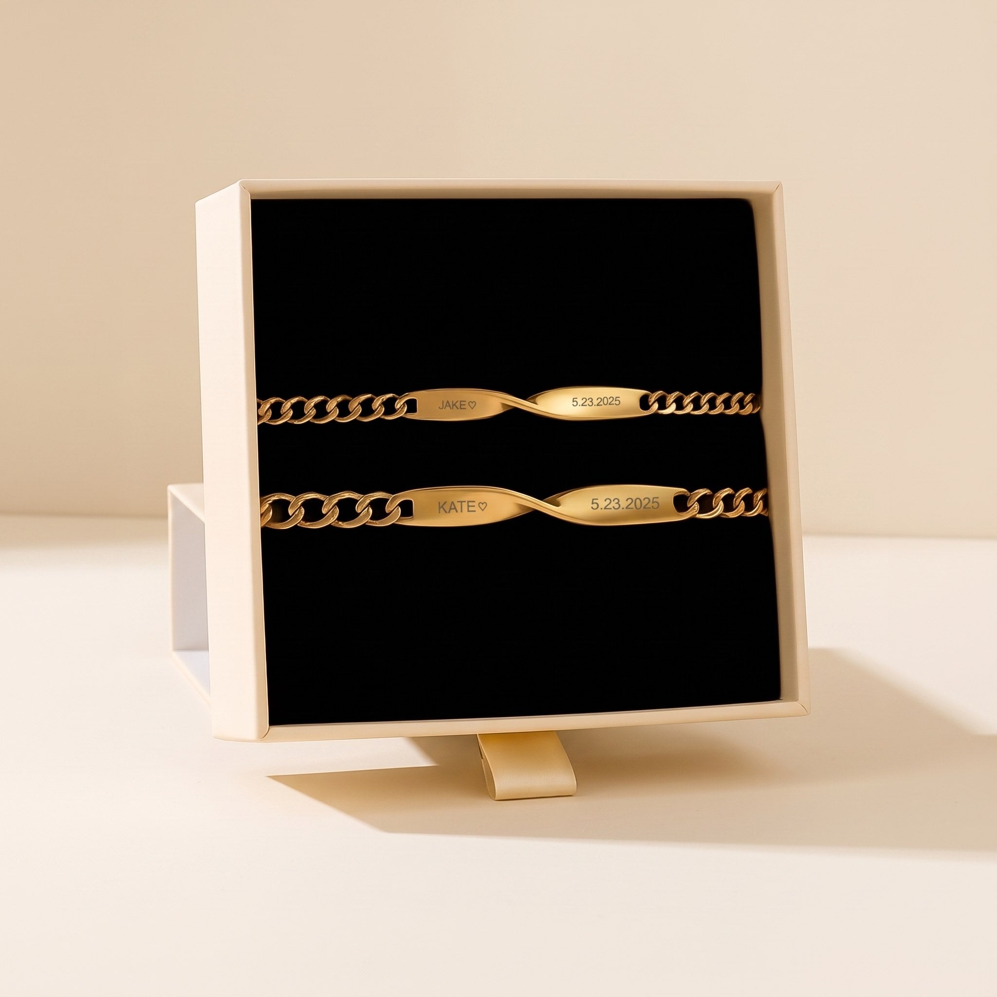 The engraved bracelets in their gift box