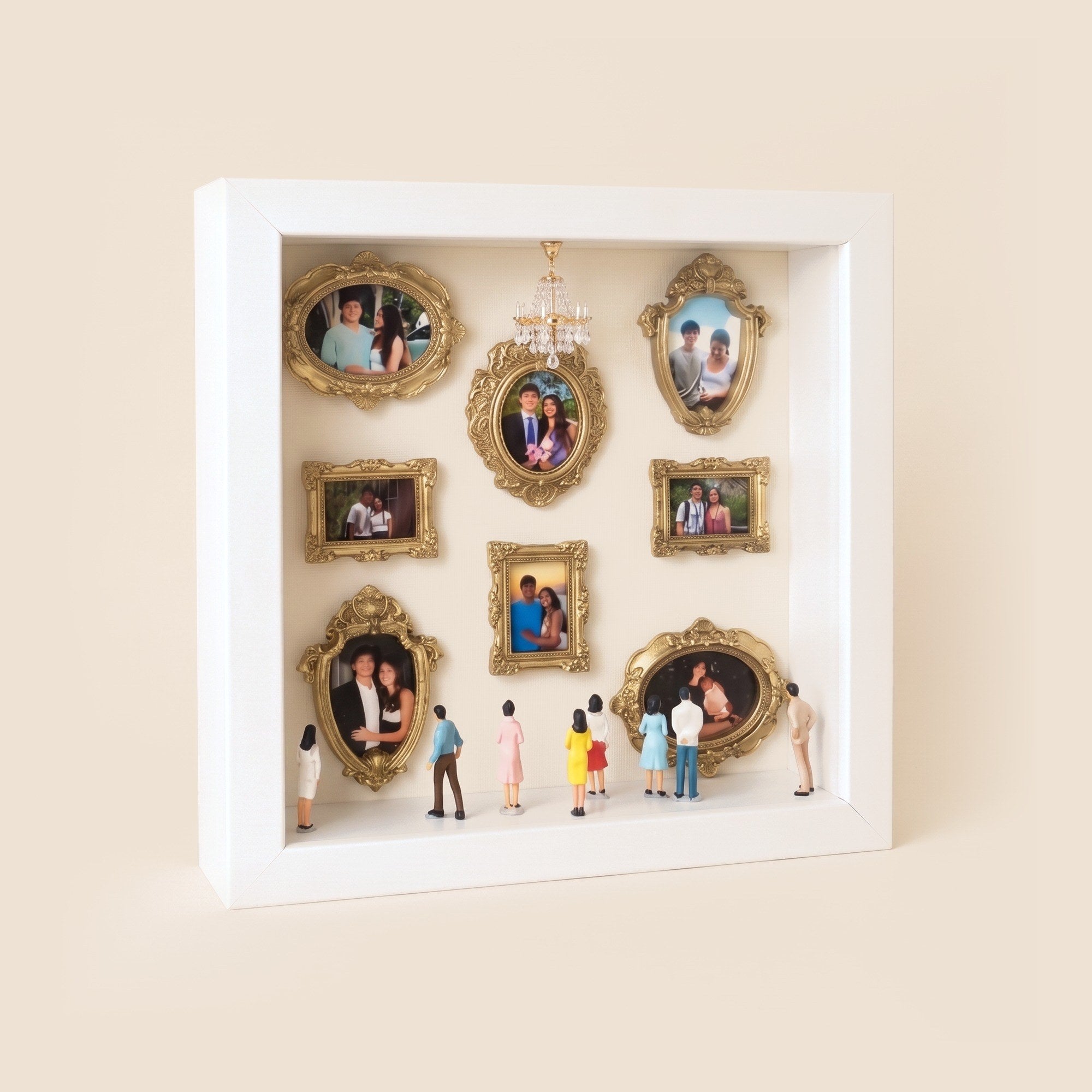 Museum of Us shadow box with little gold frames and tiny figures